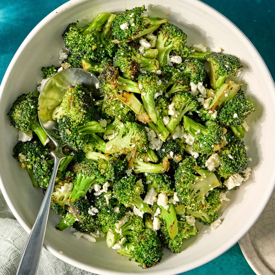 Recipe image of Melting Broccoli with Lemon & Feta Credit: Photographer: Jen Causey, Food Stylist: Julian Hensarling, Prop Stylist: Christina Daley.