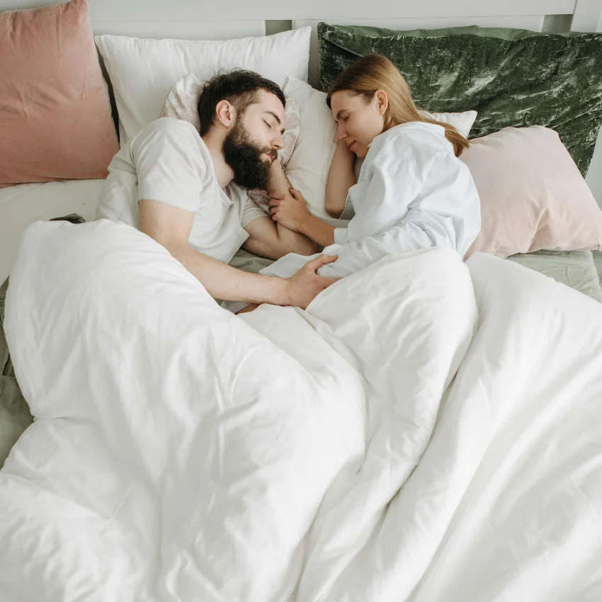 happy couple sleeping