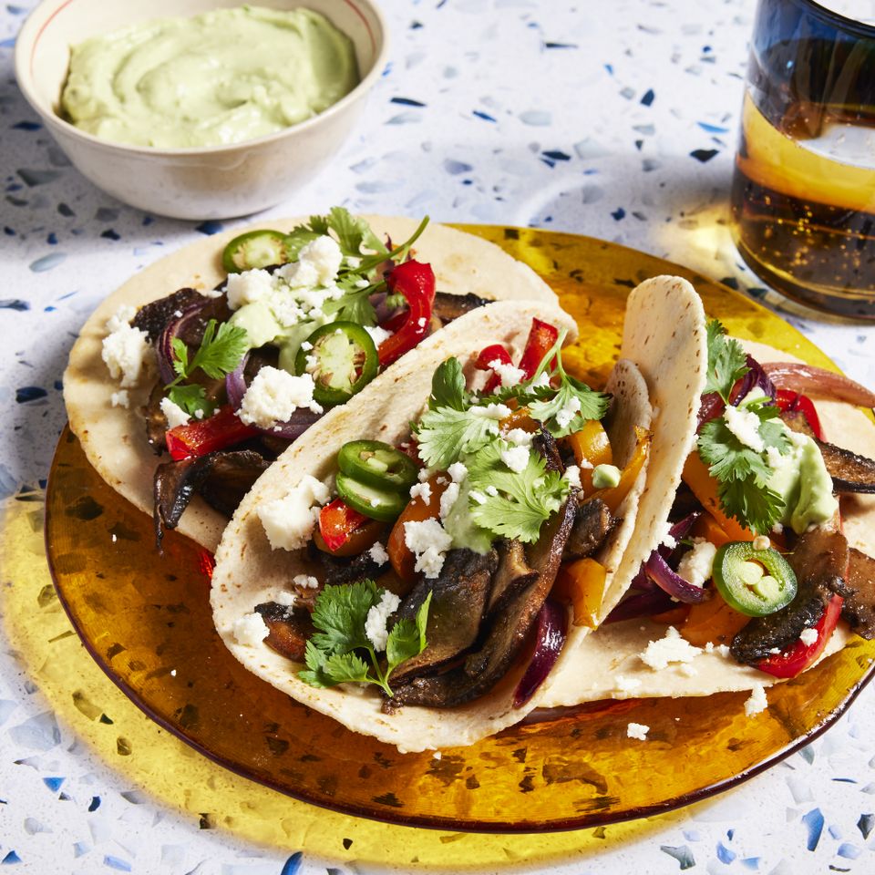 a recipe photo of the Sheet Pan Portobello Fajitas served on a plate Credit: Photographer: Jen Causey, Food Stylist: Chelsea Zimmer