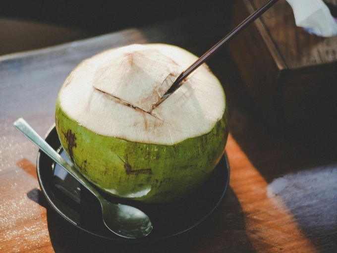 A fresh coconut drink. Photo by Pexels
