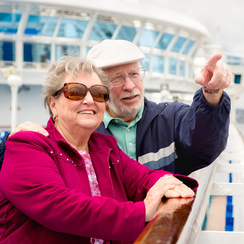 elderly couple enjoying a cruise