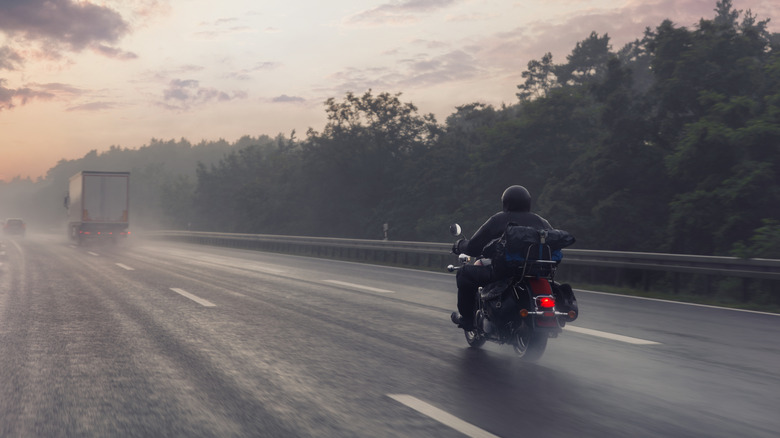 Motorcycle on wet highway