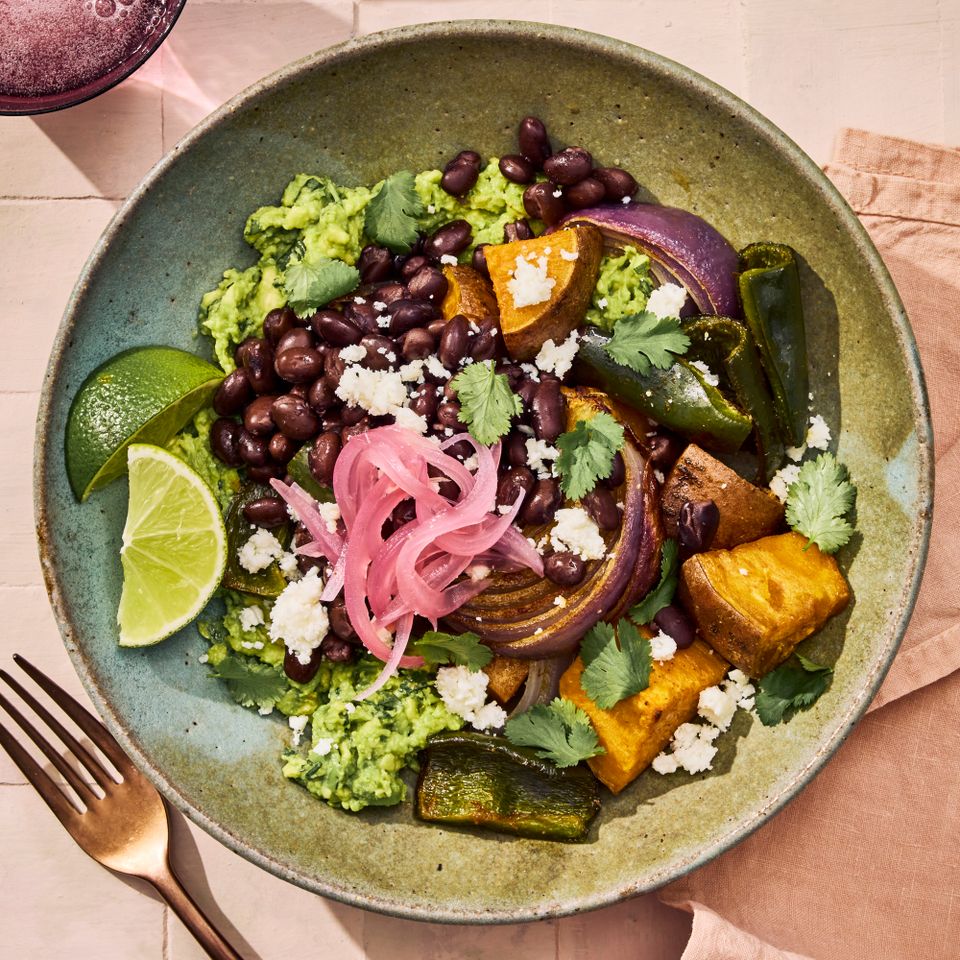 an image of the Roasted Veggie & Black Bean Bowls Credit: Photographer: Morgan Hunt Glaze, Prop Stylist: Pricilla Montiel, Food Stylist: Chelsea Zimmer
