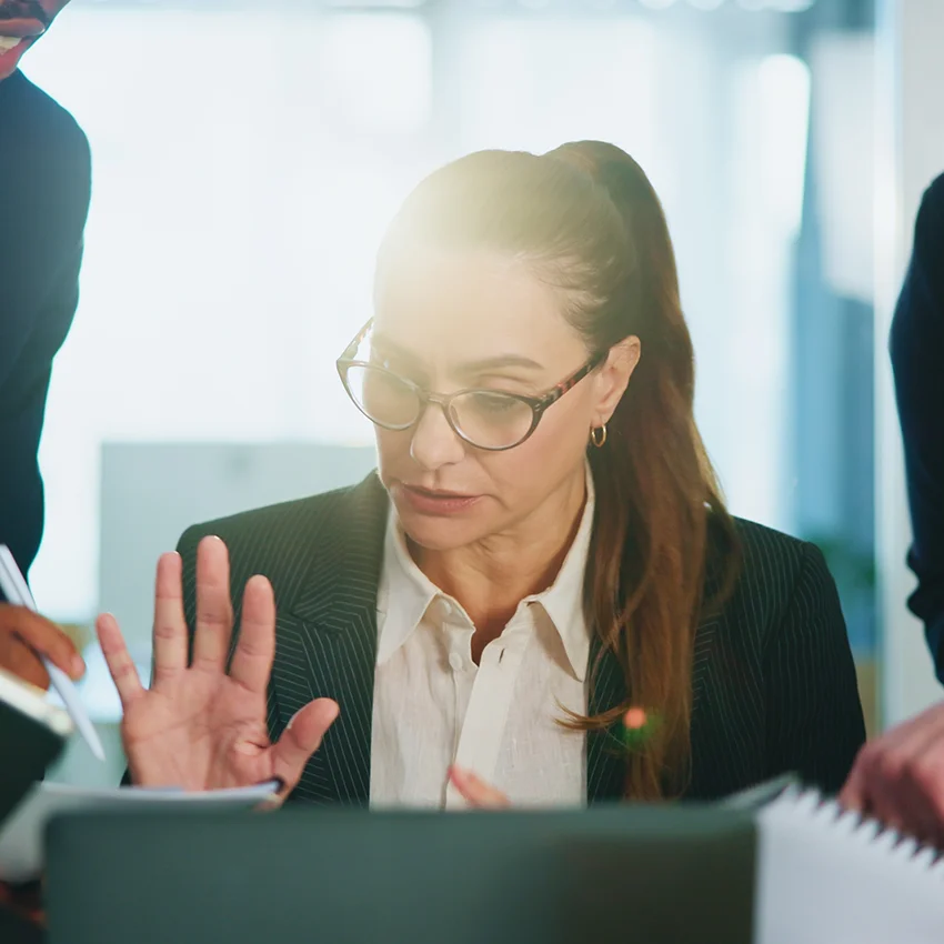 investment banker slammed with work at her job