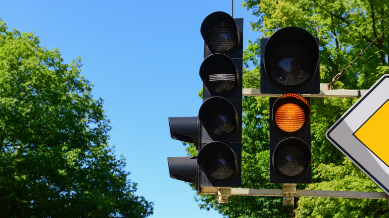 A traffic light on yellow