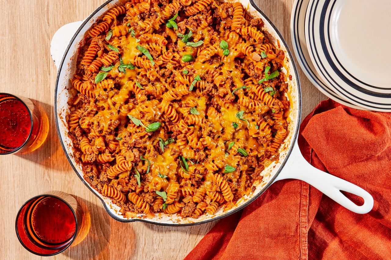 overhead shot of cheesy beef pasta in a white skillet Credit: Photographer: Morgan Hunt Glaze, Food Stylist: Julian Hensarling, Prop Stylist: Shell Royster