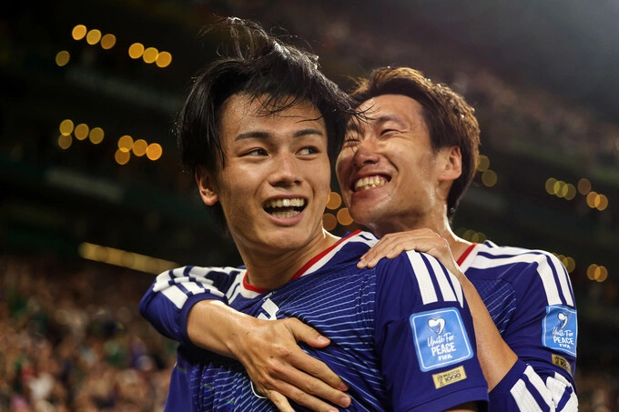 Ayase Ueda (left) and Daichi Kamada celebrate the goal to increase the score to 2-0 for Japan in the victory over Tunisia in the second round of Group F of the 2026 World Cup in Guadalupe, near Monterrey, Mexico on June 20. Photo: AP