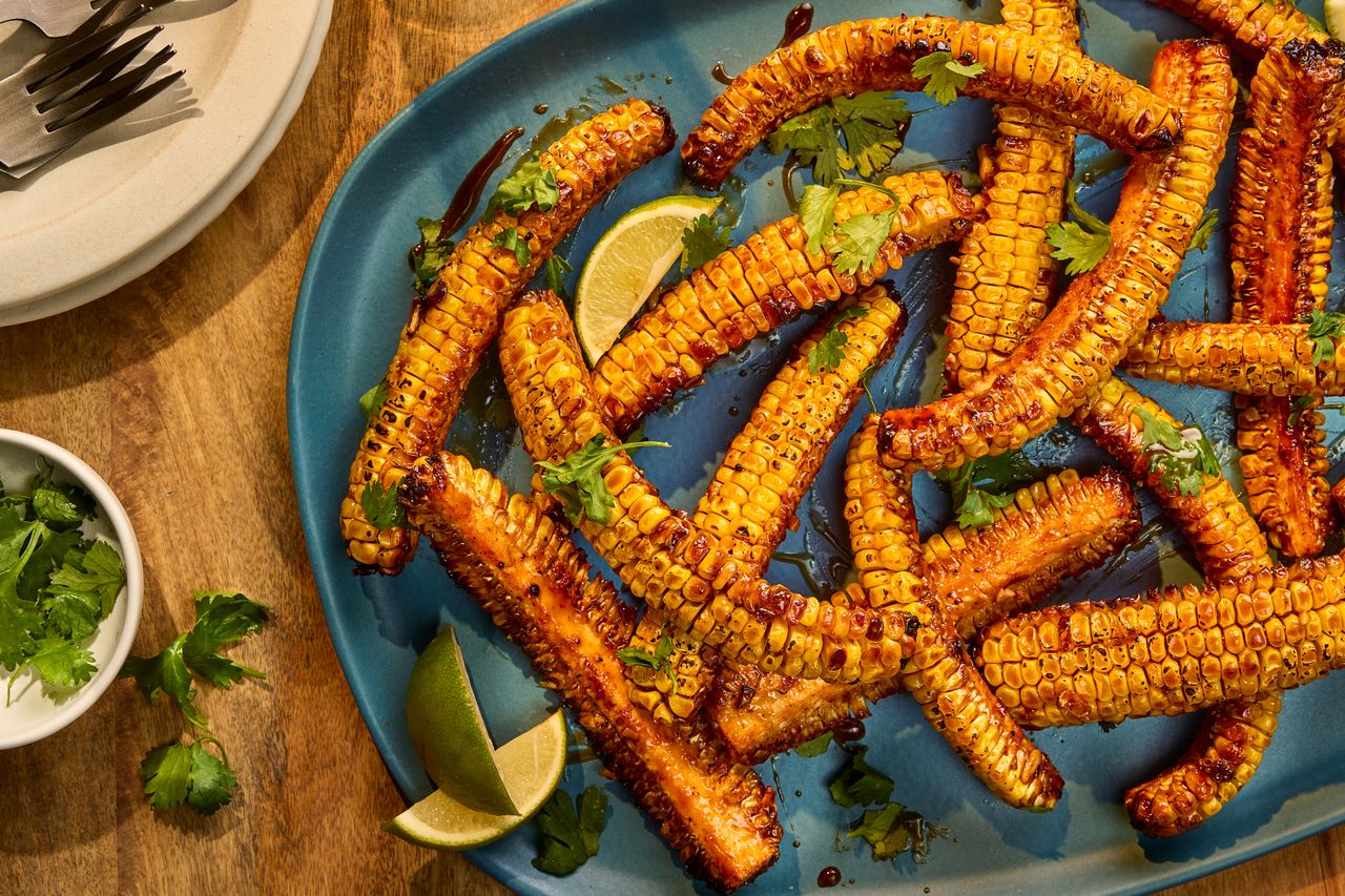 a recipe photo of the Sticky Hoisin Corn Ribs Credit: Photographer: Hannah Hufham, Food Stylist: Melissa Gray, Prop Stylist: Abby Armstrong