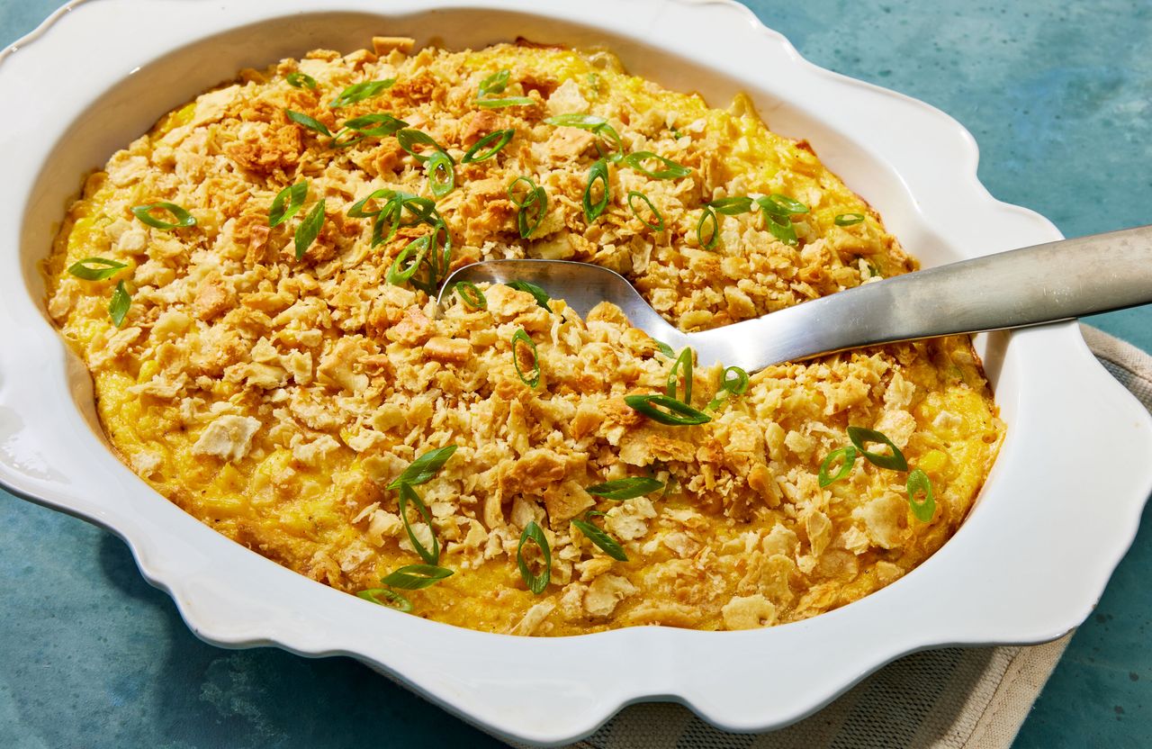 The scalloped corn recipe in a white baking pan Credit: Photographer: Jen Causey, Food Stylist: Ruth Blackburn