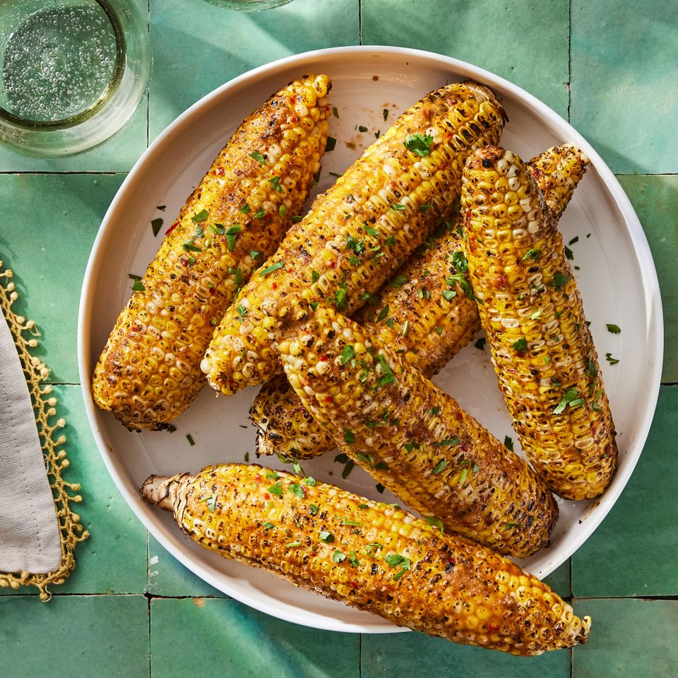 a recipe photo of the Jerk Corn on the Cob Credit: Photographer: Rachel Marek, Food stylist: Holly Dreesman, Prop stylist: Addelyn Evans