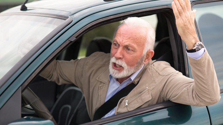 A driver expressing anger in traffic