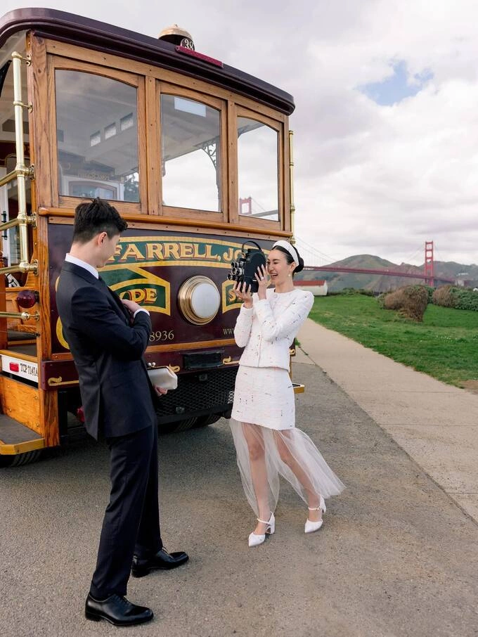 After exchanging vows, she changed into a Chanel tweed two-piece for cable car photos around the city, describing the colorful design as right for exploring San Francisco as newlyweds.