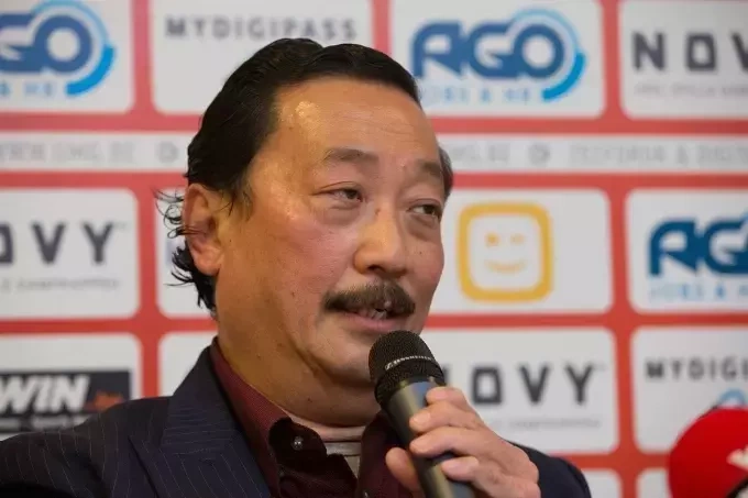 Vincent Tan pictured during a press conference, May 21, 2015. Photo by Belga via AFP