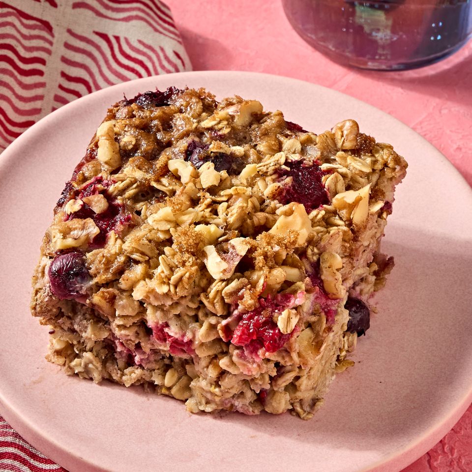 A recipe image of Mixed Berry-Walnut Baked Oatmeal. Credit: Photographer: Jen Causey, Food Stylist: Chelsea Zimmer, Prop Stylist: Claire Spollen.