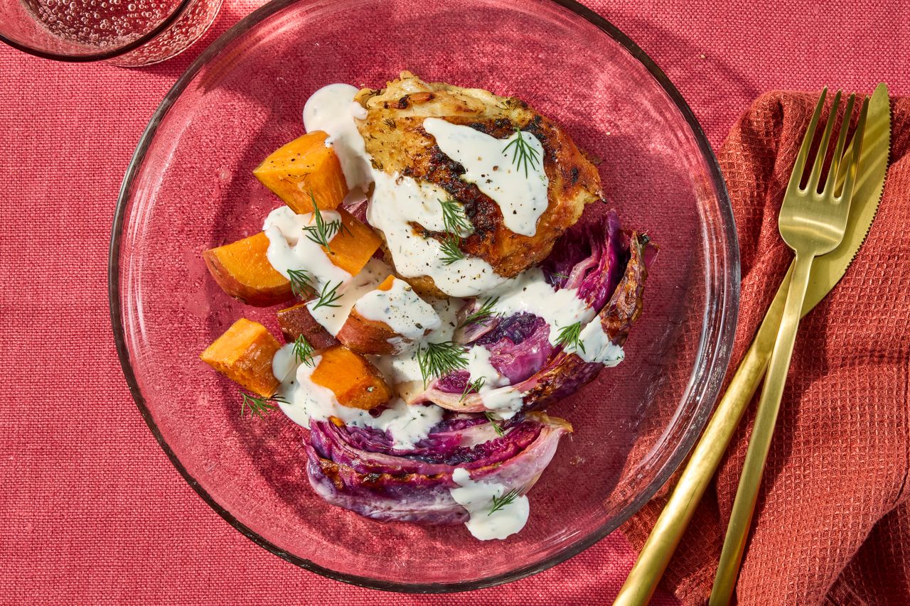 Image of Sheet-Pan Chicken Thighs with Red Cabbage & Potatoes Credit: photographer: Jen Causey, food stylist: Julian Hensarling, prop stylist: Josh Hoggle