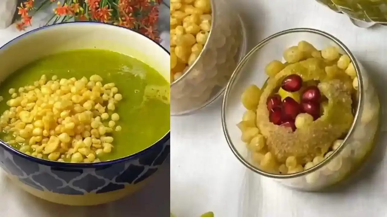 A bowl of spicy green pani puri water topped with boondi beside a crispy shell filled with pomegranate.