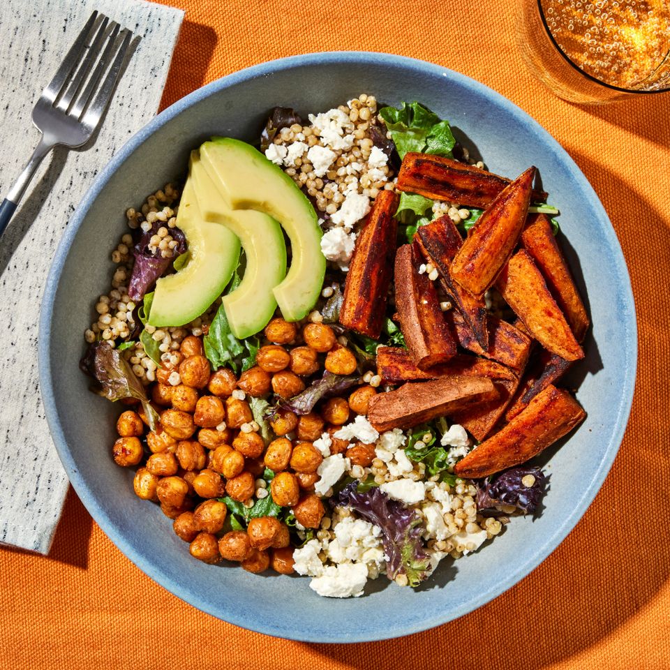 a photo of the Chickpea & Sweet Potato Grain Bowl served in a bowl Credit: Photographer: Jen Causey, Food Stylist: Jennifer Wendorf, Prop Stylist: Christina Brockman