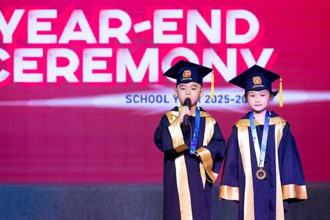 Nguyen Van Tuan Khoi (L)s parents shared their pride after watching him emcee the VAS Year-End Ceremony. Photo courtesy of the family. Photo courtesy of the school