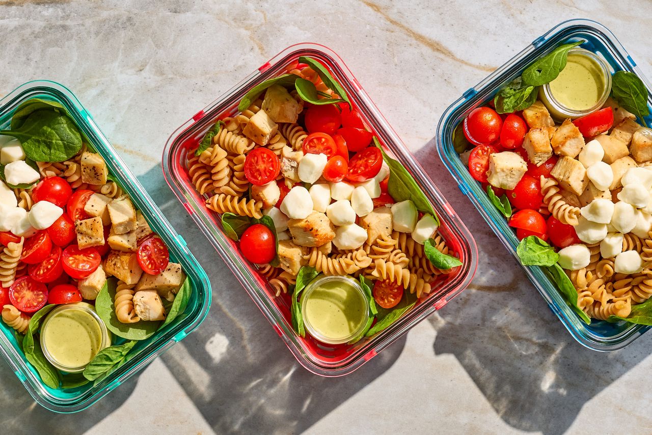 A recipe image of Chicken Caprese Pasta Salad Bowls. Credit: Photographer: Jake Sternquist, Food Stylist: Annie Probst, Prop Stylist: Gabriel Greco.