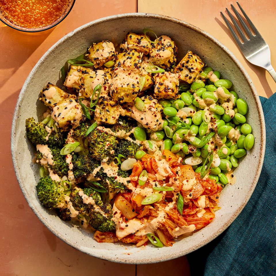 a photo of the Kimchi Broccoli Bowl served in a bowl Credit: Photographer: Robby Lozano, Food Stylist: Jennifer Wendorf, Prop Styling: Christina Brockman