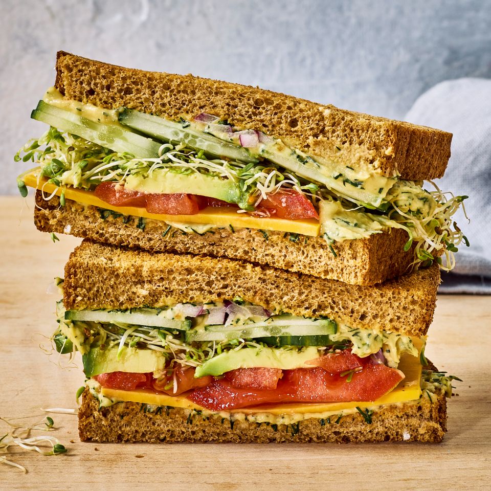 an image of the Avocado-Tomato-Cucumber Sandwich Credit: Photographer: Morgan Hunt Glaze, Prop Stylist: Pricilla Montiel, Food Stylist: Chelsea Zimmer