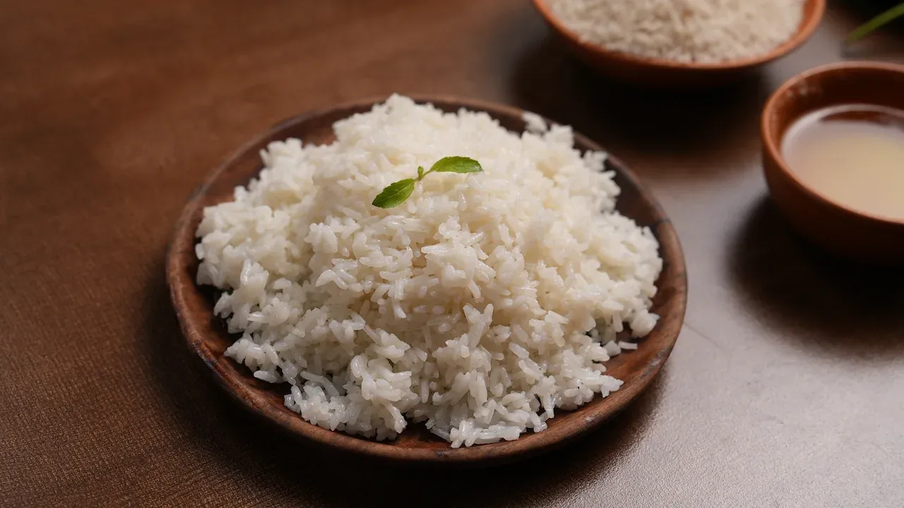 Traditional Ghia Anna, a simple Odia-style ghee rice made with Sona Masuri rice and garnished with holy basil, served as part of Jagannath Rath Yatra Mahaprasad.