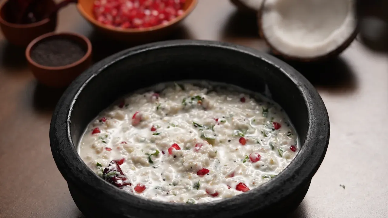 Traditional Nadia Pachedi, an Odia-style yogurt and fresh coconut relish with pomegranate, tempered with mustard seeds and curry leaves, served for Jagannath Rath Yatra.