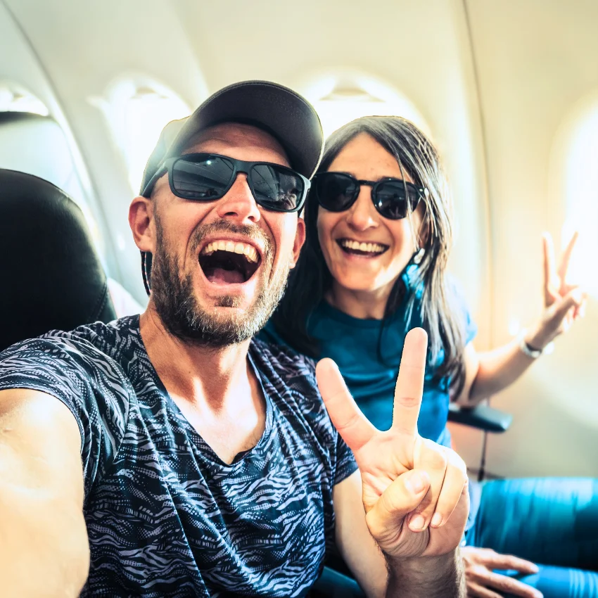Emotionally stable couple traveling on an airplane.