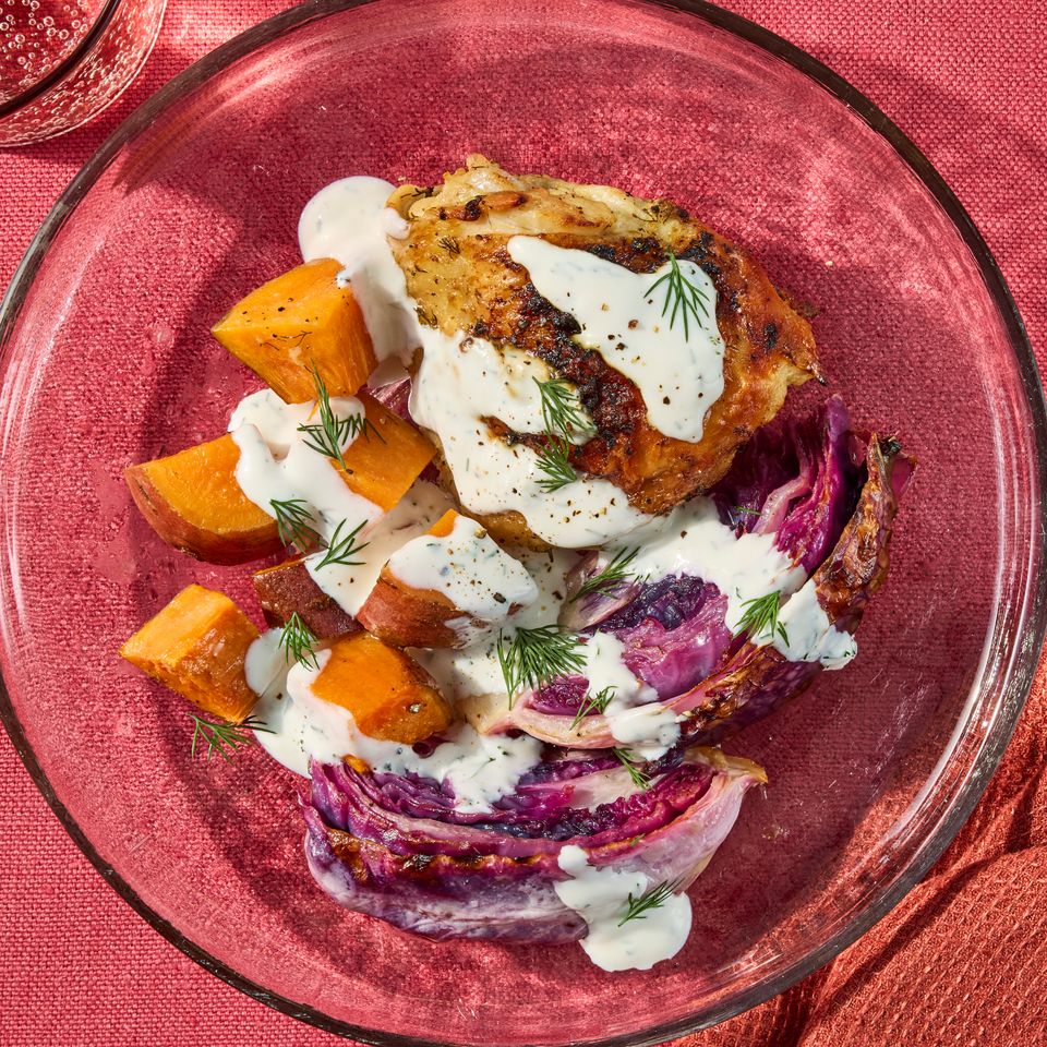 Image of Sheet-Pan Chicken Thighs with Red Cabbage & Potatoes Credit: photographer: Jen Causey, food stylist: Julian Hensarling, prop stylist: Josh Hoggle