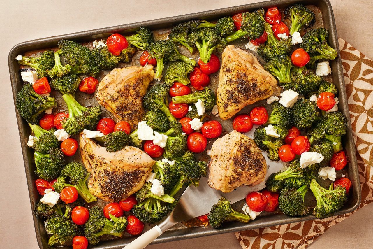 Sheet Pan Lemon Pepper Chicken with Broccoli and Tomatoes Credit: Ali Redmond