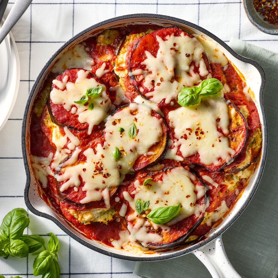 an image of the Cheesy Roasted Eggplant Skillet Casserole Credit: Photographer: Jake Sternquist, Food Stylist: Lauren McAnelly, Prop Stylist: Addelyn Evans