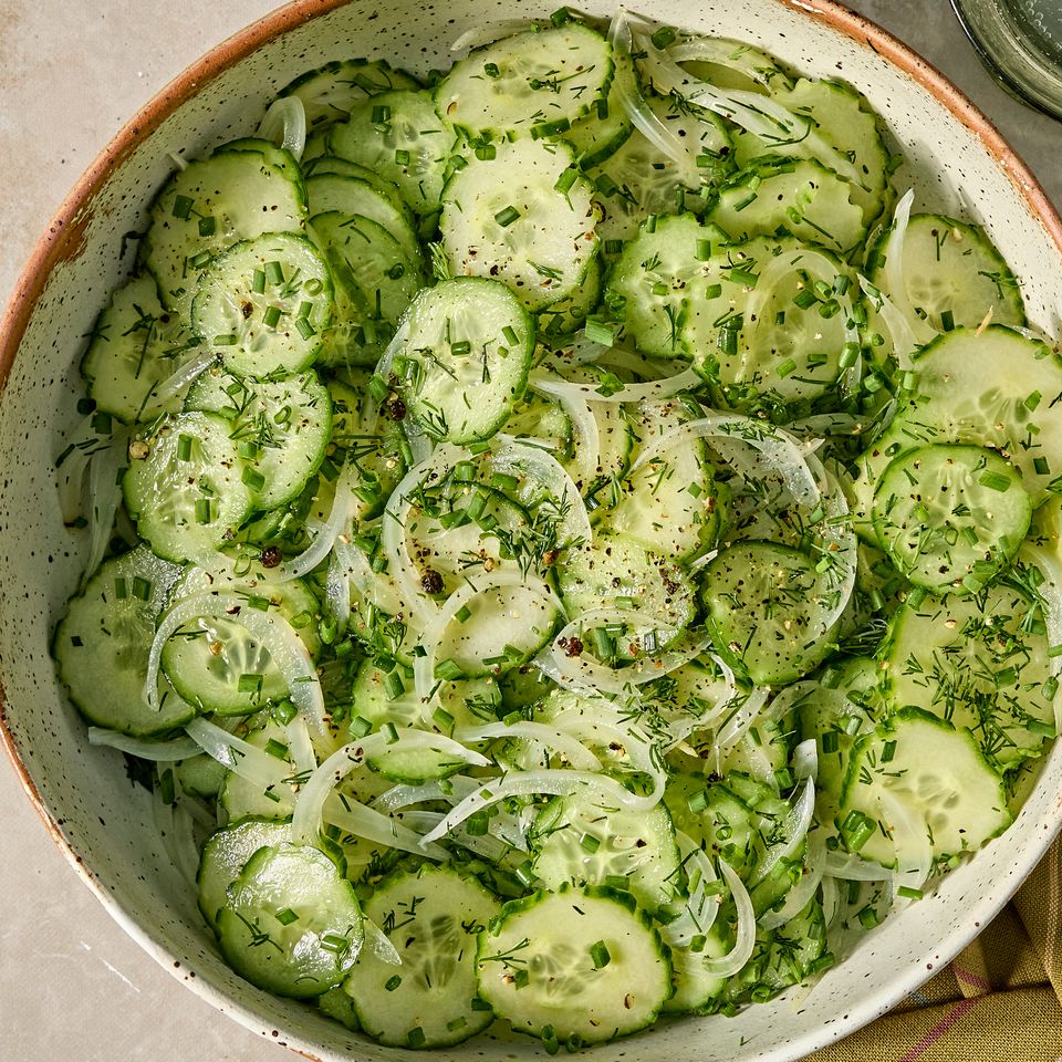 Recipe image of Easy Marinated Cucumbers Credit: Photographer: Jen Causey, Food Stylist: Julian Hensarling, Prop Stylist: Christina Daley.