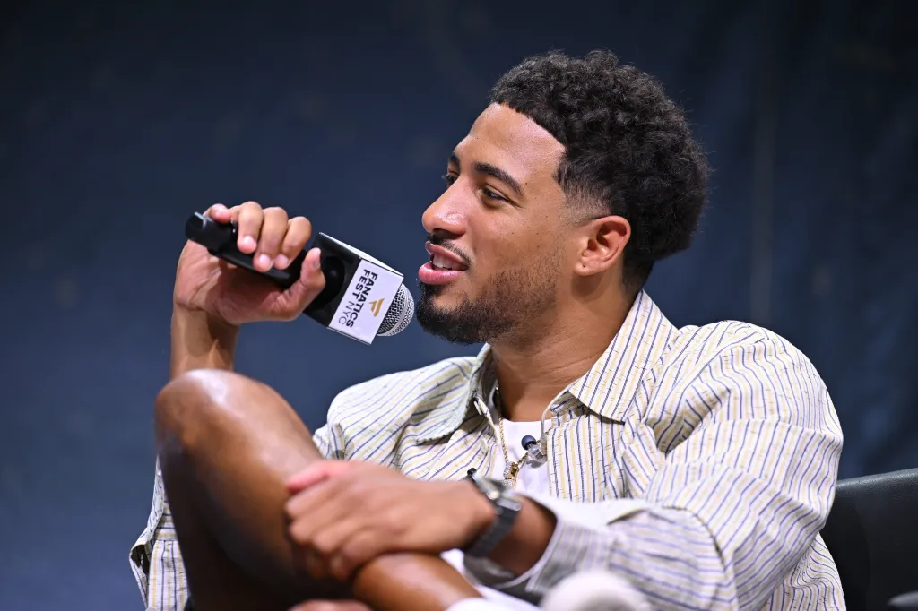 Tyrese Haliburton speaking onstage during the mind the game panel at Fanatics Fest NYC 2026.