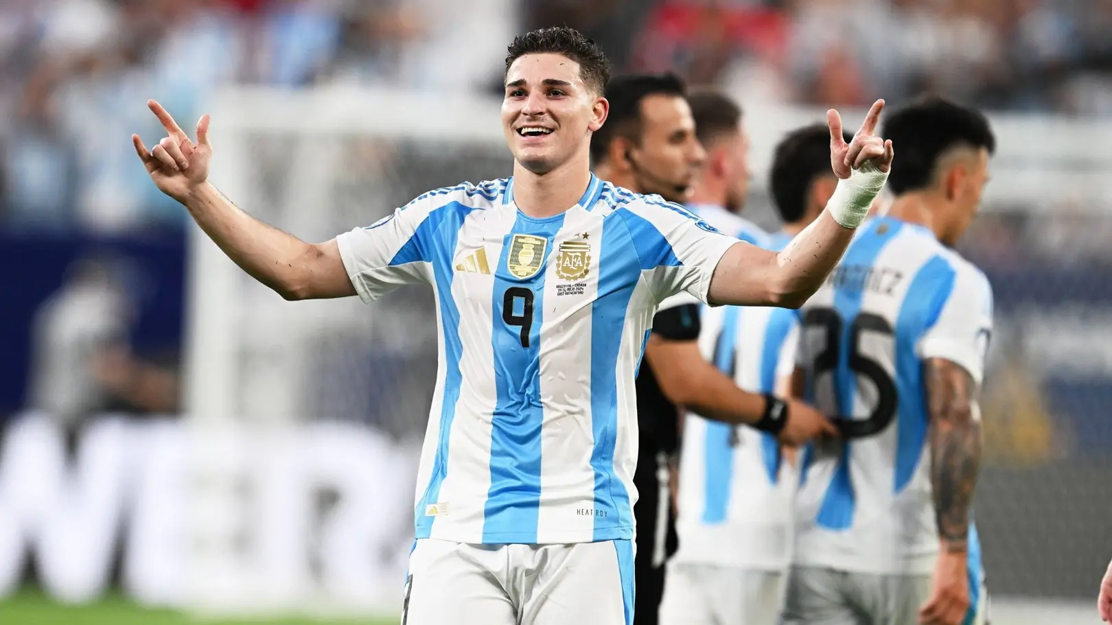 Julian Alvarez celebrating during a football match for Argentina.