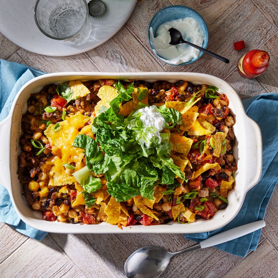 A casserole dish with the beef & black bean nacho casserole recipe Credit: Photographer: Rachel Marek, Food Stylist: Holly Dreesman, Prop Stylist: Sue Mitchell