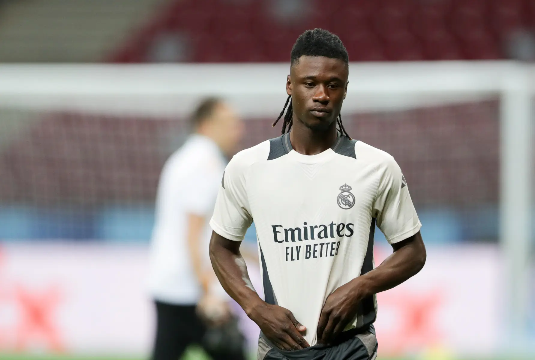 Eduardo Camavinga wearing a white Real Madrid training kit during a practice session.