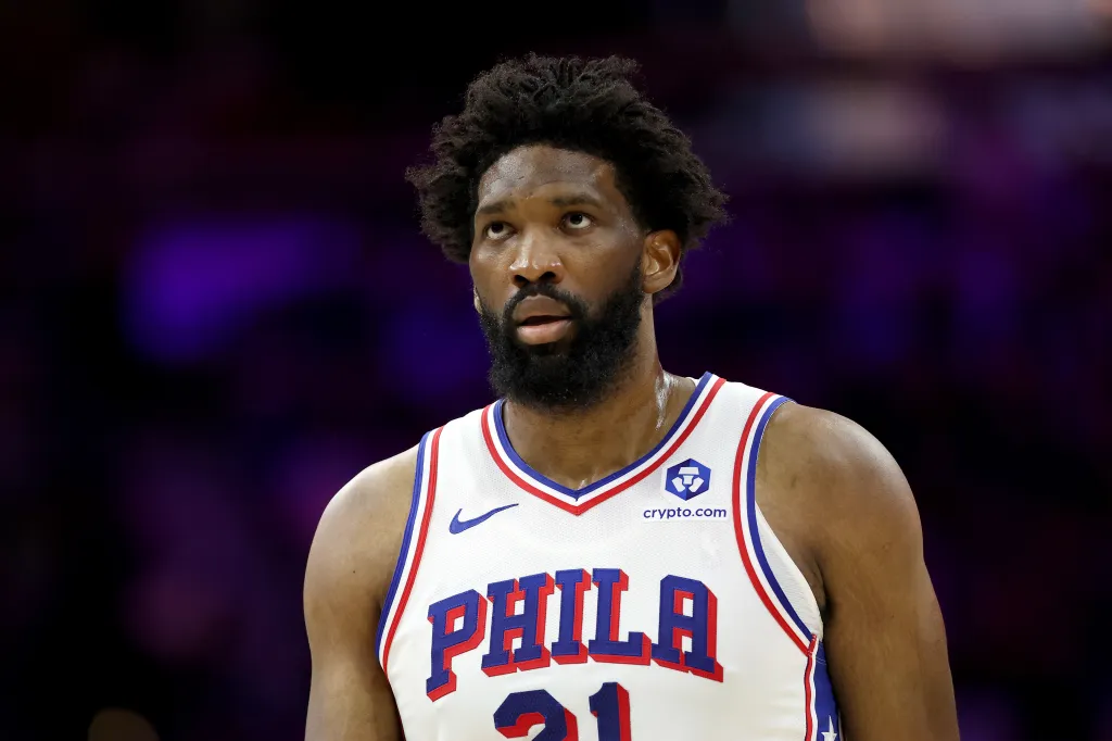 Philadelphia 76ers center Joel Embiid looks on.