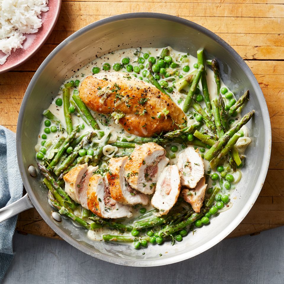 Prosciutto & Fontina Stuffed Chicken with Spring Vegetables Credit: Jacob Fox