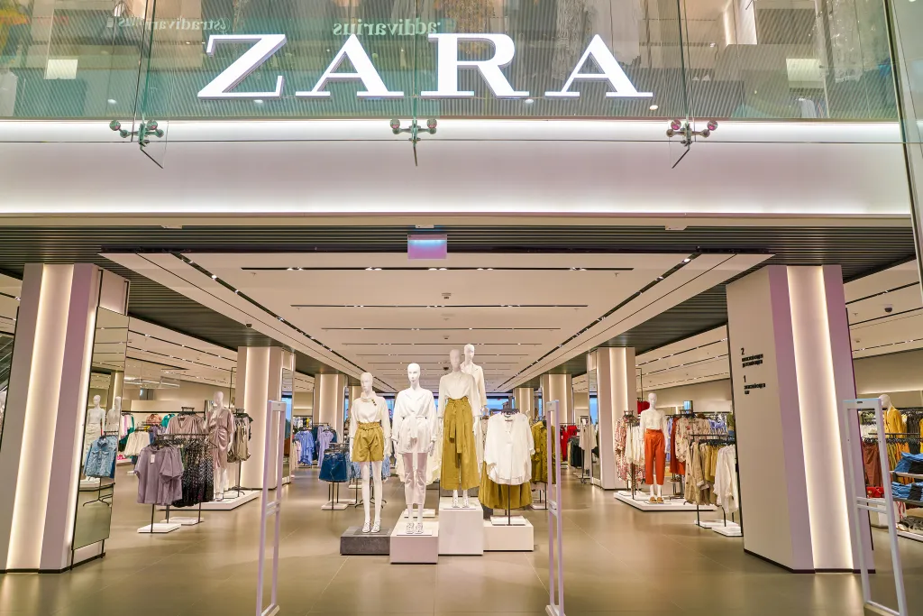 Entrance to a Zara clothing store in a shopping center.