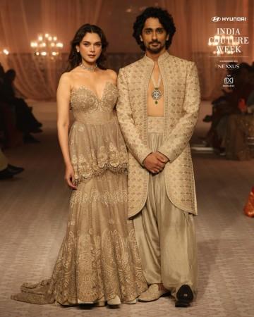 Aditi Rao Hydari looks sensuous in bralette-style lehenga; Siddharth flaunts abs in unbuttoned kurta; couple gets romantic on runway