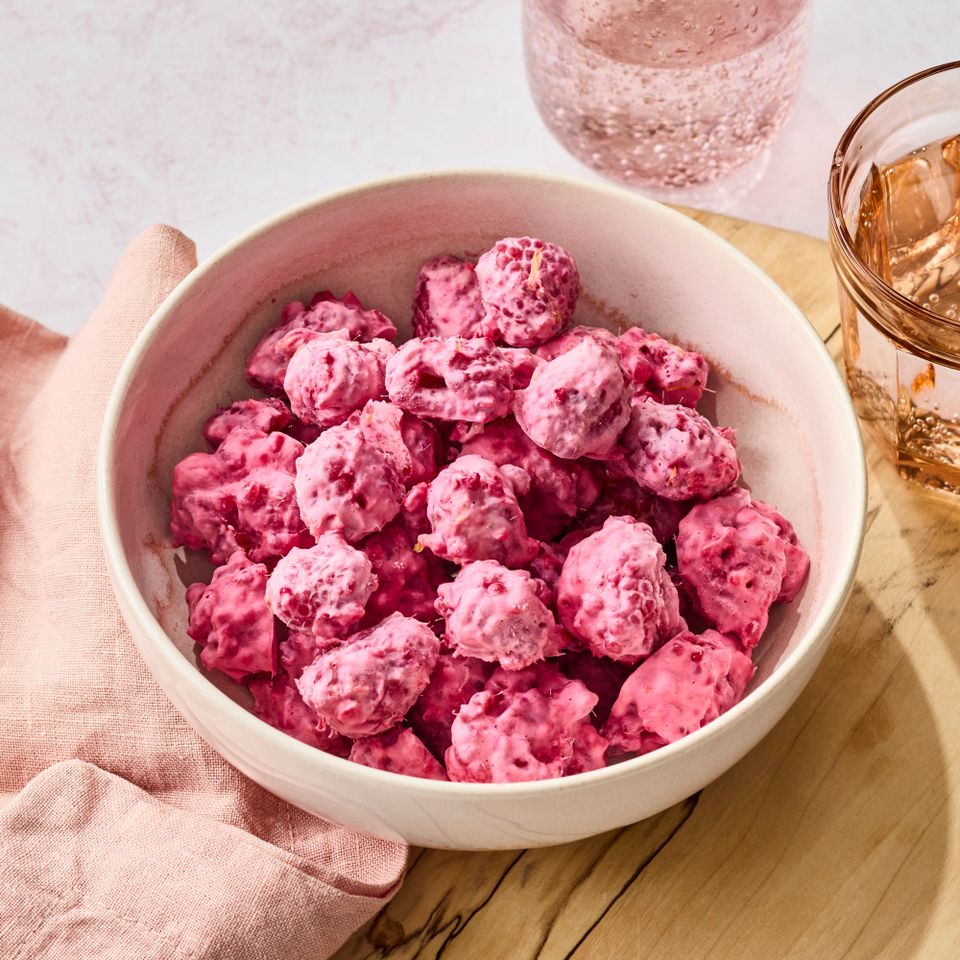 an image of the Lemon-Raspberry Frozen Yogurt Bites Credit: Photographer: Victor Protasio, Food Stylist: Chelsea Zimmer, Prop Stylist: Christina Daley