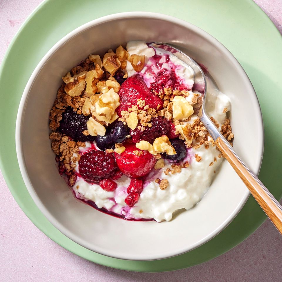 a recipe photo of the Crunchy Berry Bowl Credit: Photographer: Grant Webster, Food Stylist: Lauren McAnelly, Prop Stylist: Gabriel Greco