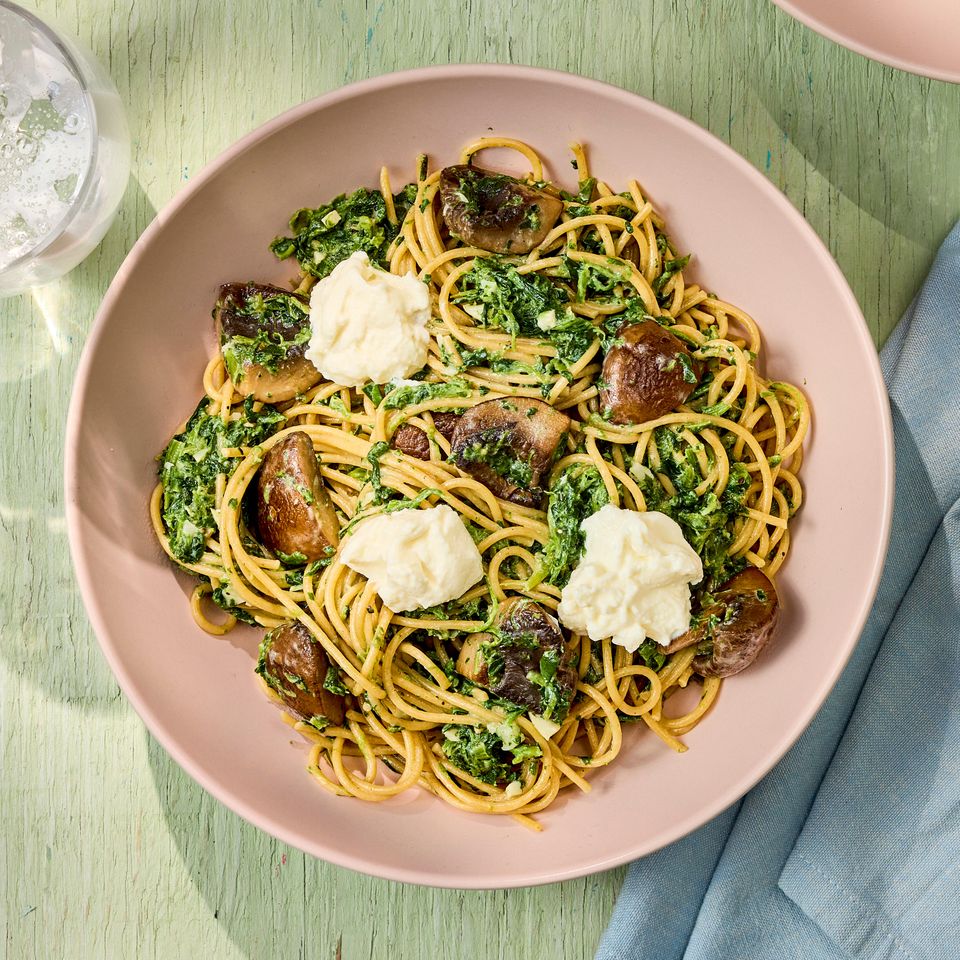 a recipe photo of Spaghetti with Mushrooms, Spinach & Ricotta Credit: Photographer: Robby Lozano, Food Stylist: Jennifer Wendorf, Prop Styling: Josh Hoggle.