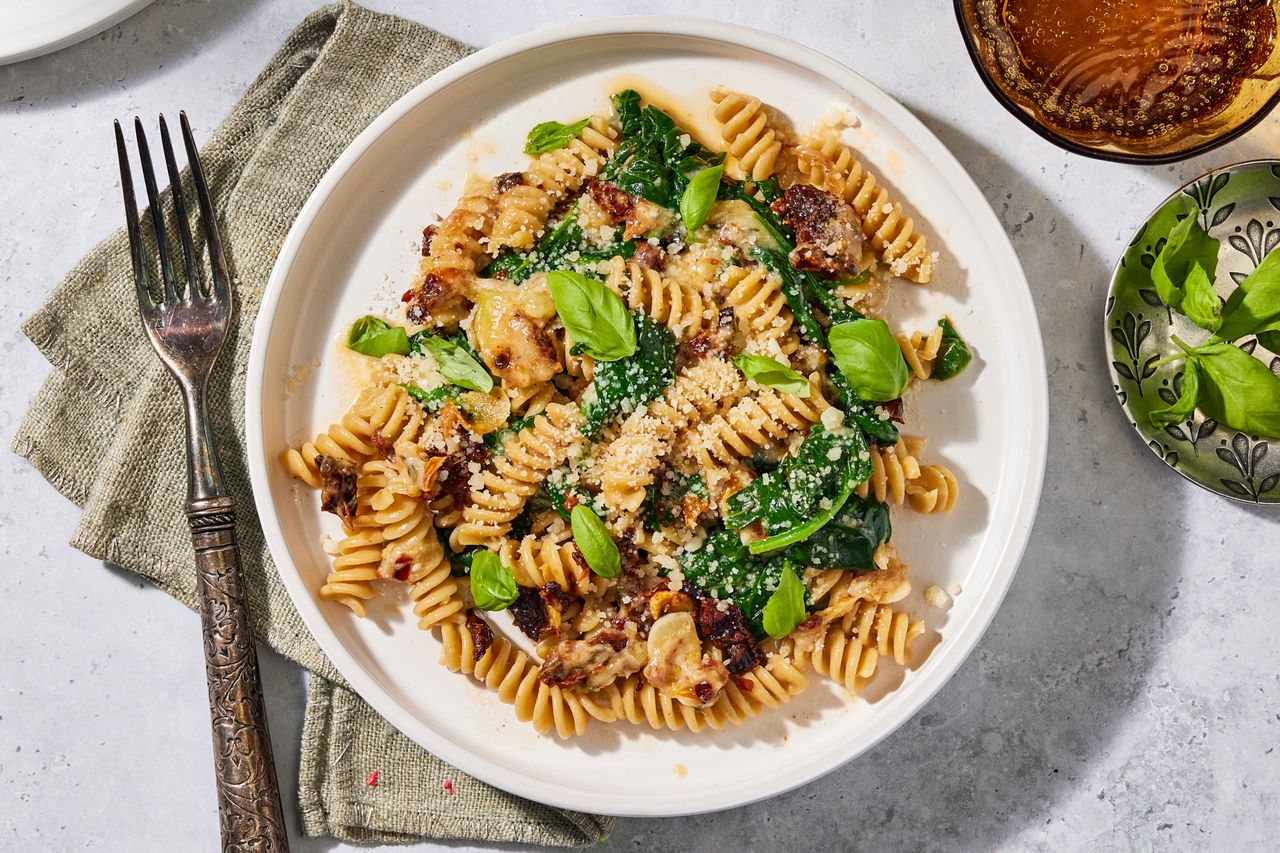an image of the Baked Brie & Sun-Dried Tomato Pasta Credit: Photographer: Robby Lozano, Food Stylist: Marianne Williams, Prop Stylist: Josh Hoggle