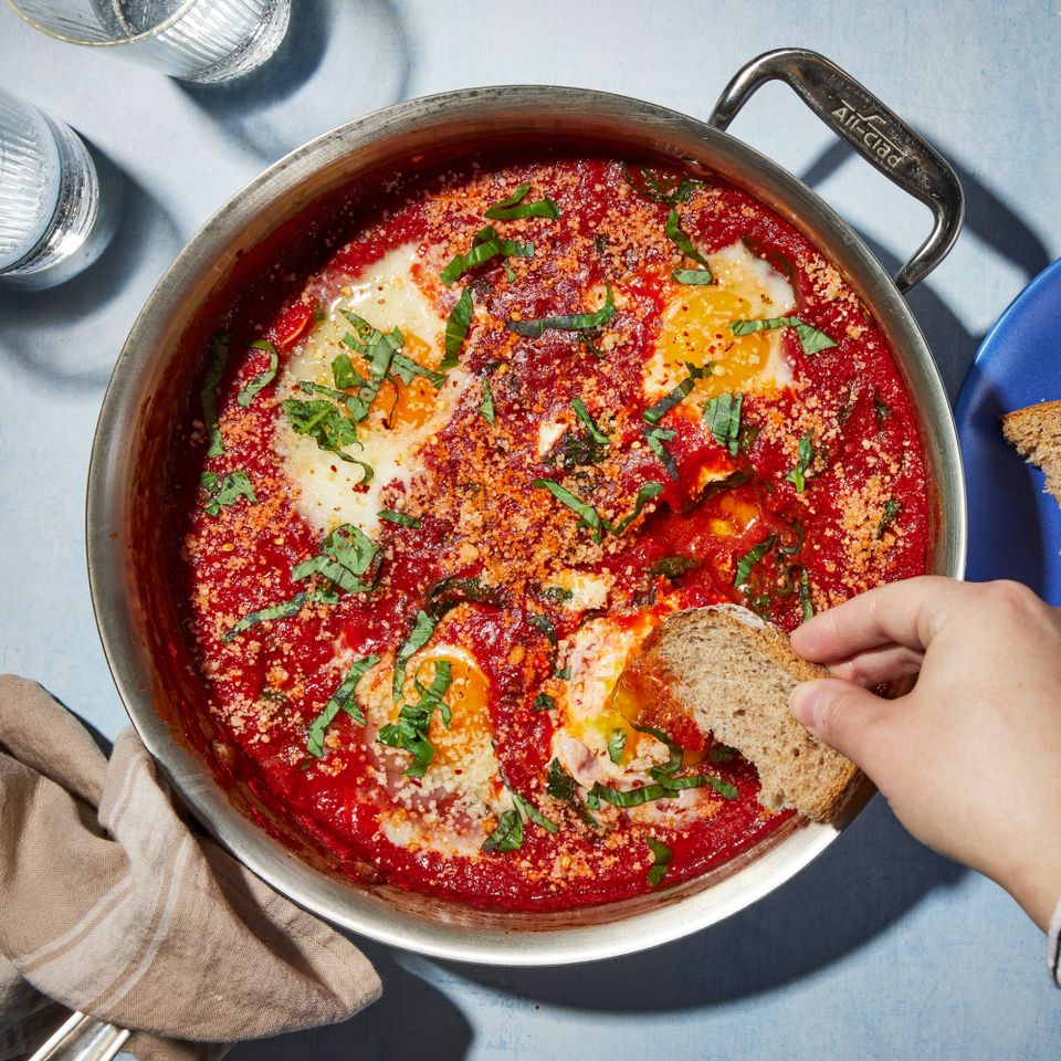 a recipe photo of the Eggs in Purgatory Credit: Photographer: Jen Causey, Food Stylist: Julian Hensarling, Prop Stylist: Josh Hoggle