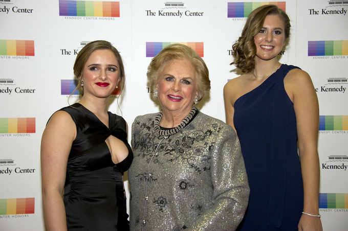 Jacqueline Mars, center, and her granddaughters, Graysen Airth, left, and Katherine Burgstahler, right, arrive for the formal Artists Dinner honoring the recipients of the 40th Annual Kennedy Center Honors in Washington, D.C. on Saturday, December 2, 2017. Photo by Getty Images via AFP