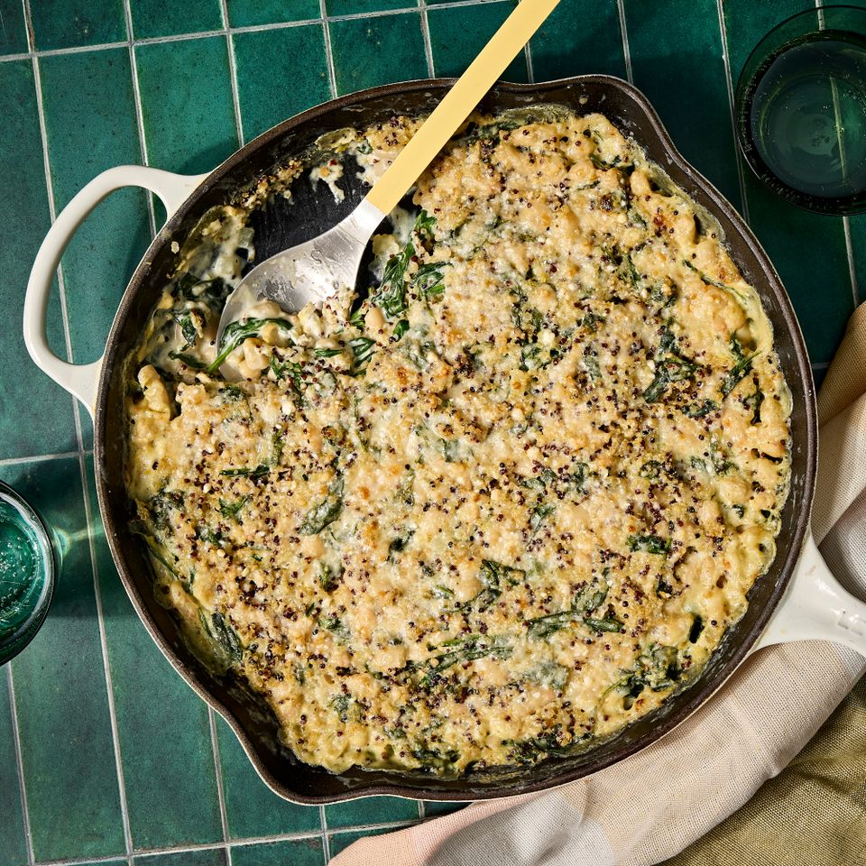 Recipe image of Creamy Lemon-Parmesan Spinach & White Bean Casserole. Credit: Photographer: Jen Causey, Food Stylist: Chelsea Zimmer, Prop Stylist: Claire Spollen.