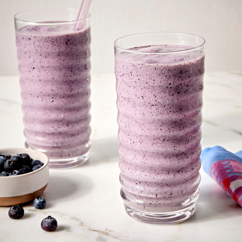 Recipe image of Blueberry Oatmeal Smoothie Credit: Photographer: Jen Causey, Food Stylist: Chelsea Zimmer, Prop Stylist: Claire Spollen.