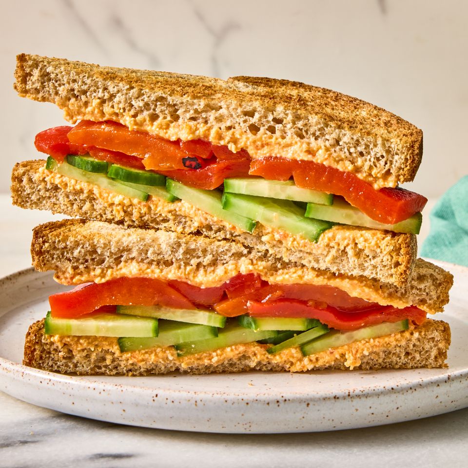 Recipe image of Cucumber, Roasted Red Pepper & Feta Sandwich. Credit: Photographer: Caley Ellenburg, Food Stylist: Jennifer Wendorf, Prop Stylist: Joshua Hoggle.