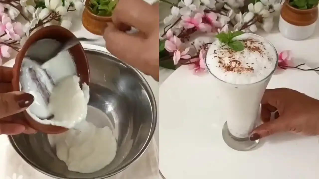 Close up view of hands pouring fresh white yogurt into a metal bowl to prepare delicious namkeen lassi.